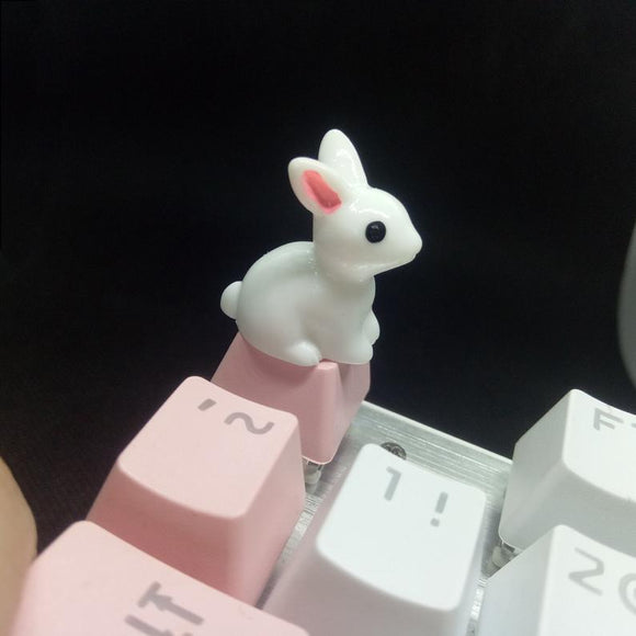 A pair of pink handmade cute white rabbit keycaps suitable for most cherry MX (+) axis mechanical keyboard keycaps